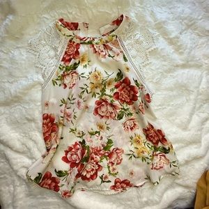 White floral top w/ lace sleeves.